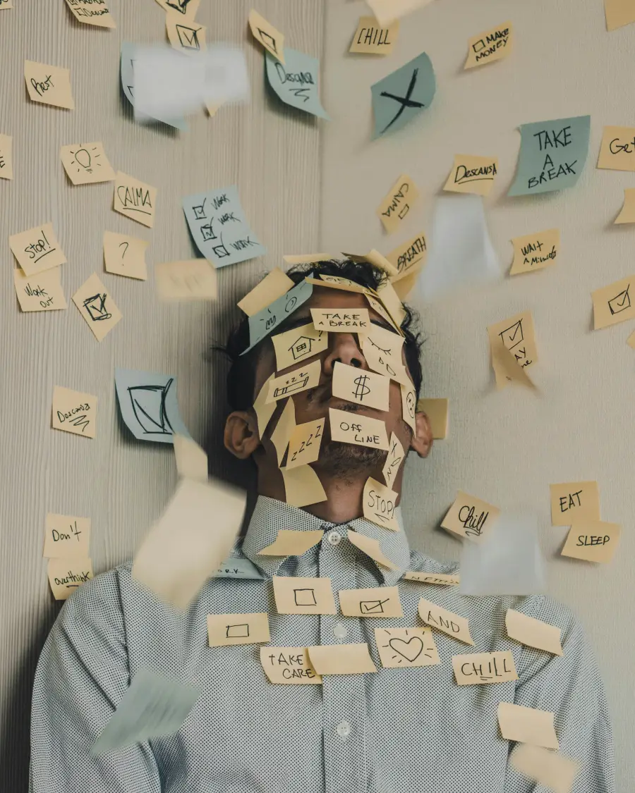 Man with post-its all over